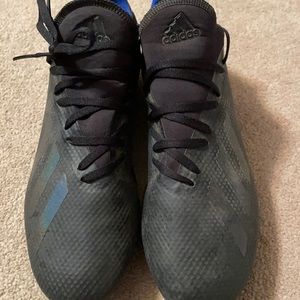 Boys Adidas cleats.
